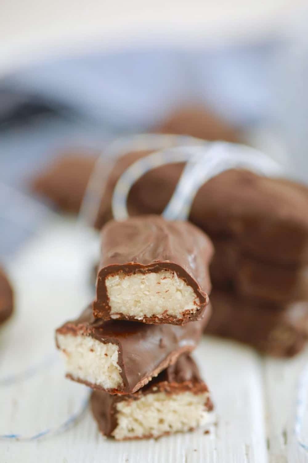 HealthyMoundsBar A stack of cut open Healthy Homemade Mounds Bars.