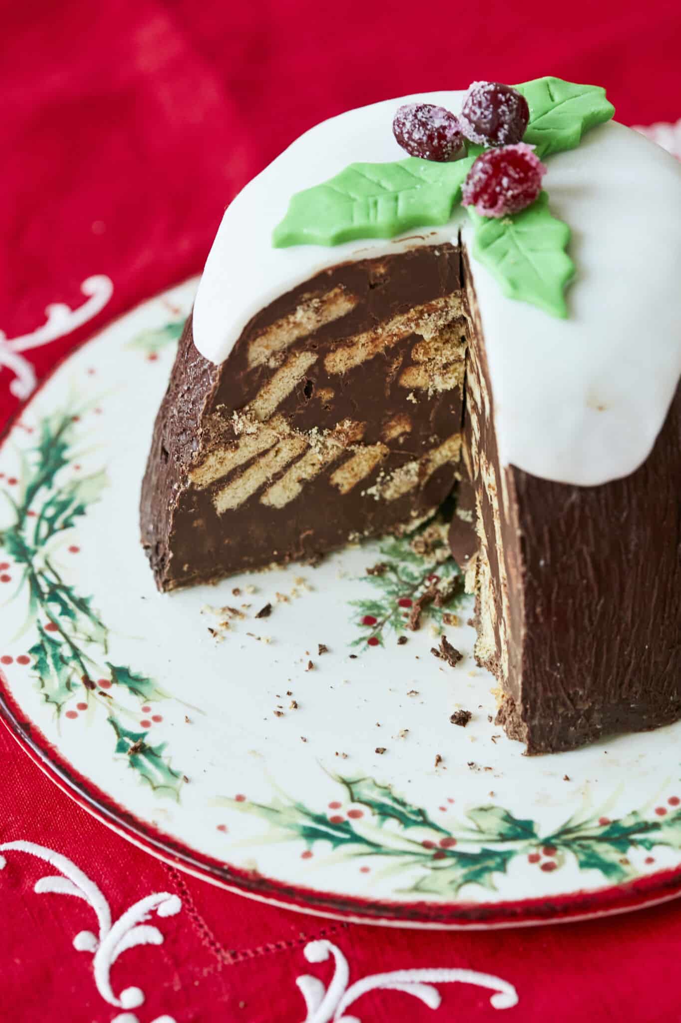 No-Bake Christmas Cake with a slice cut out, so you can see the beautiful interior of the cake!