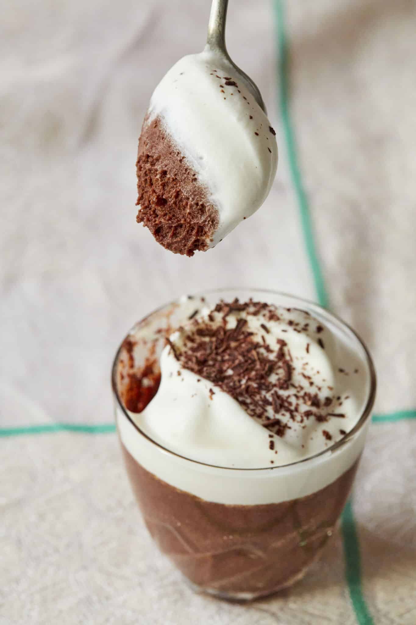 O’Driscoll’s Irish Whiskey Chocolate Mousse Recipe enjoying a spoonful of rich mousse and light whiskey cream