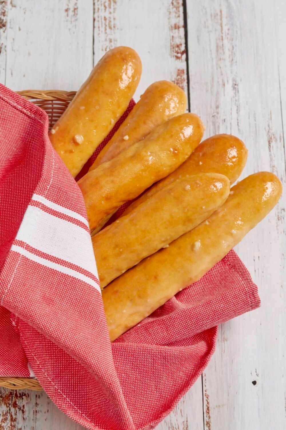 No Yeast Bread sticks7 3-Ingredient Bread Sticks (no yeast) are baked golden brown and displayed in a basket.