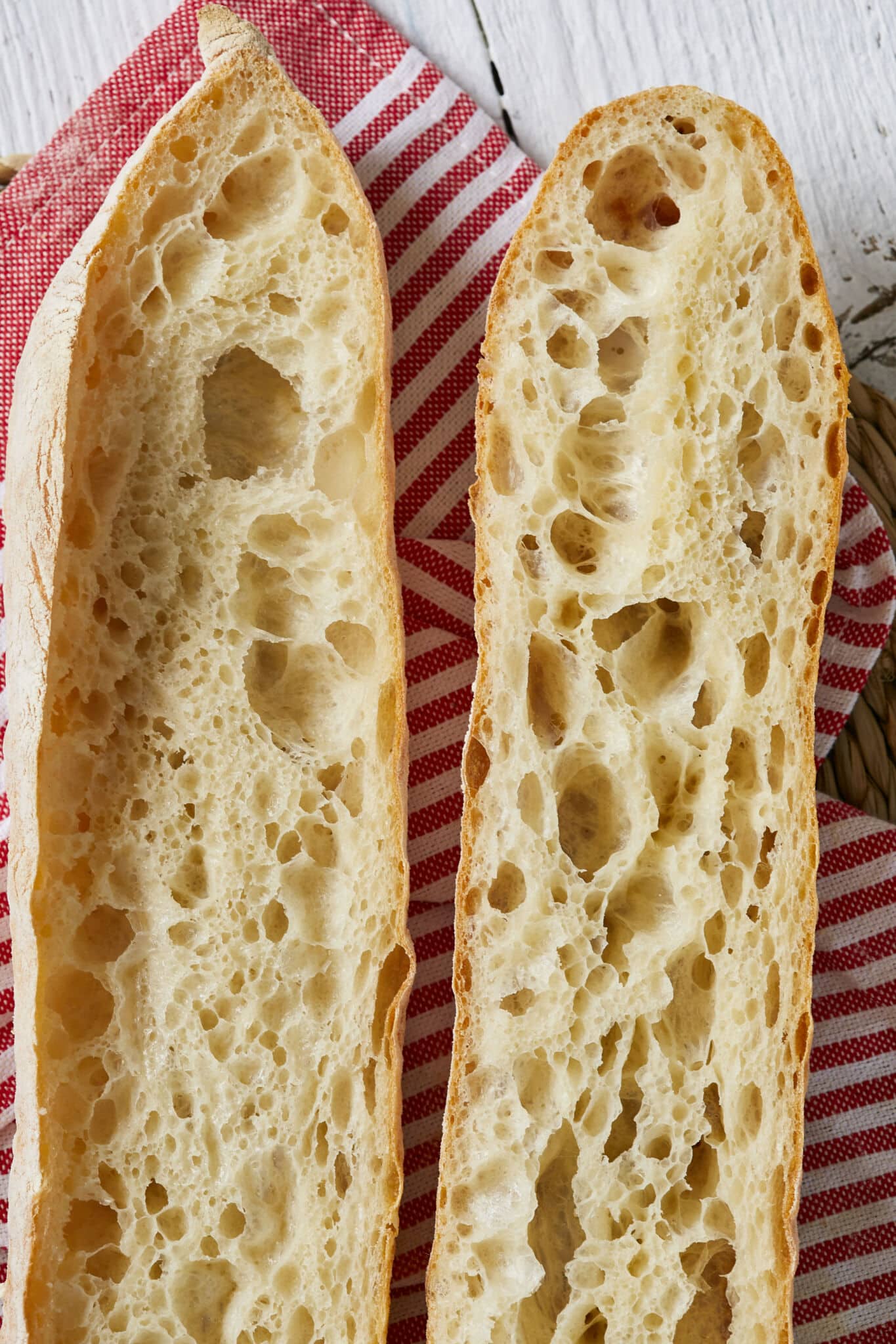 The Easiest No Knead Baguettes have golden, thin and crispy crust with stunning lacy chewy crumb. 