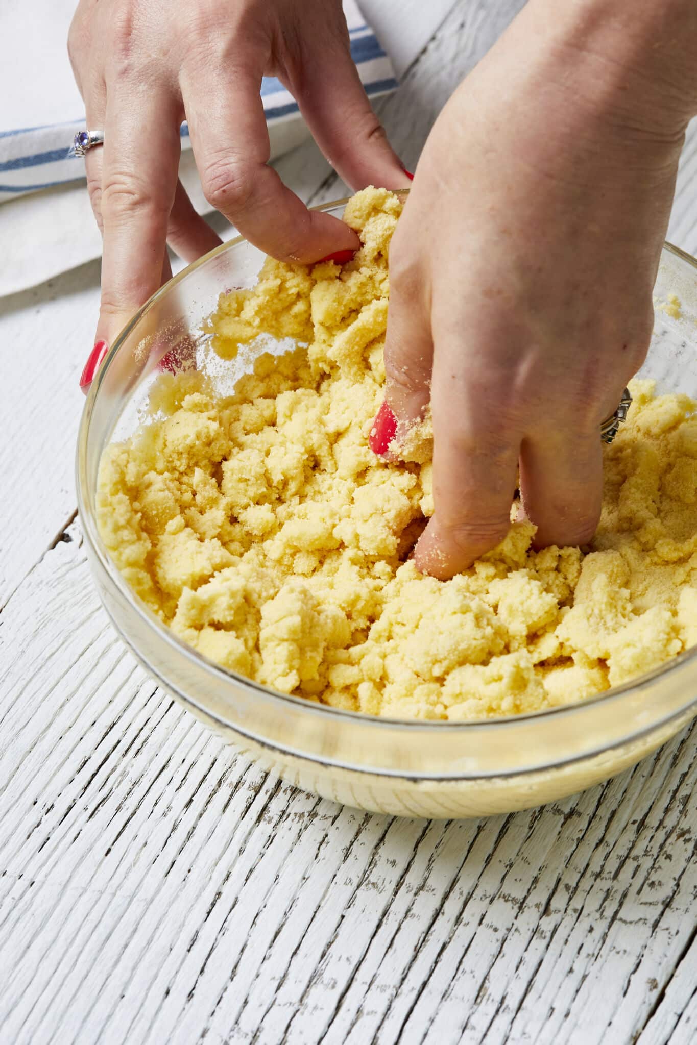 Step-by-step instructions on making semolina pasta. Hand mix semolina flour with warm water in a glass mixing bowl instead of using a food processor. 