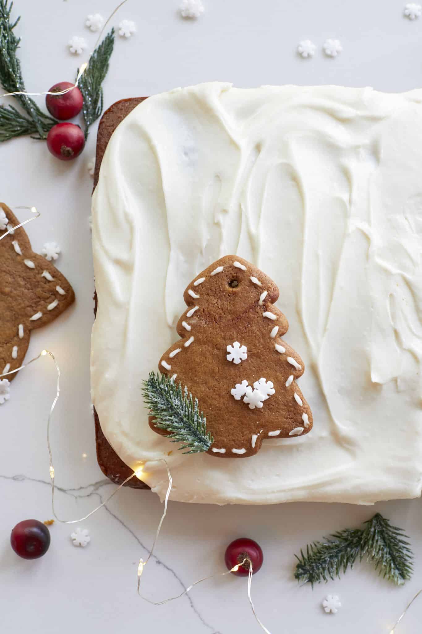 Frost the sheet cake with cream cheese frosting. 