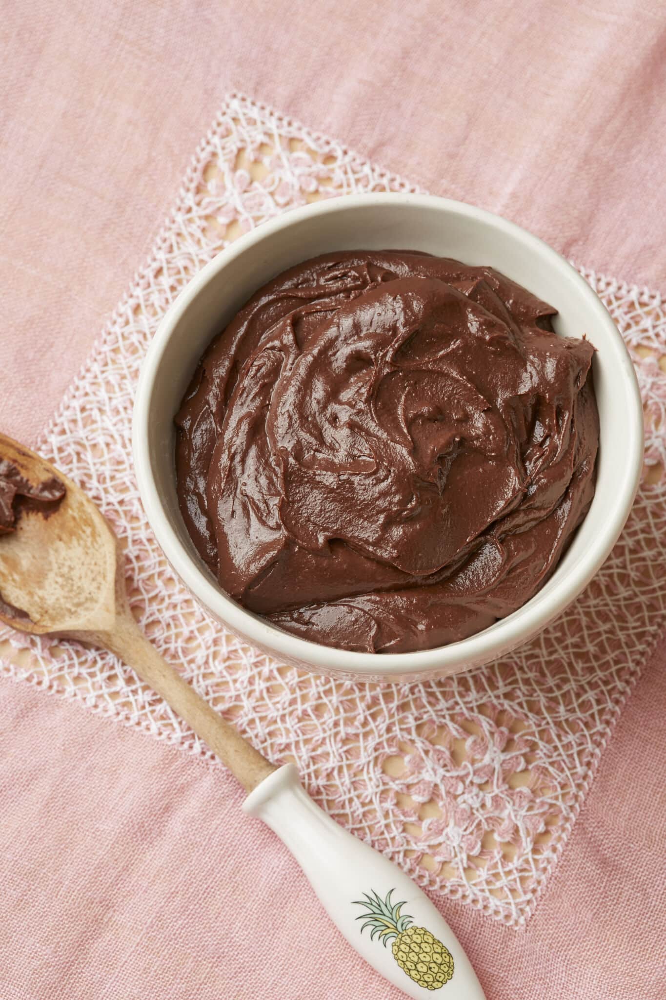A bowl of shinny, silky smooth and thick Chocolate Pastry Cream is ready to use. 
