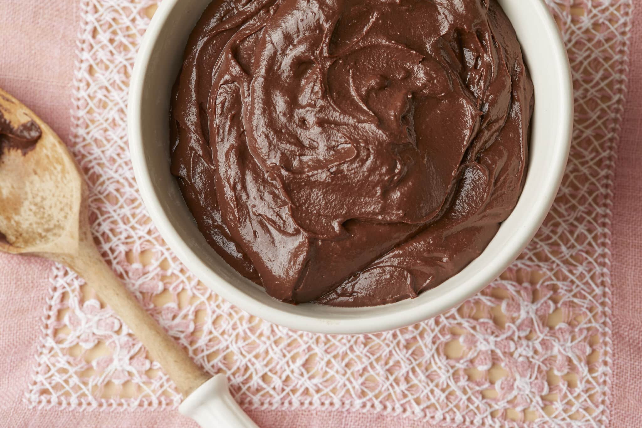 A bowl of shinny, silky smooth and thick Chocolate Pastry Cream is ready to use.