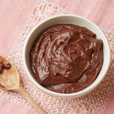 A bowl of shinny, silky smooth and thick Chocolate Pastry Cream is ready to use.
