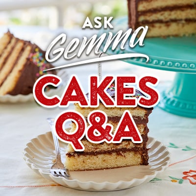 CAKE Q&A: A classical American birthday cake has 4 layers of yellow butter cake, filled and frosted with whipped milk chocolate ganache.