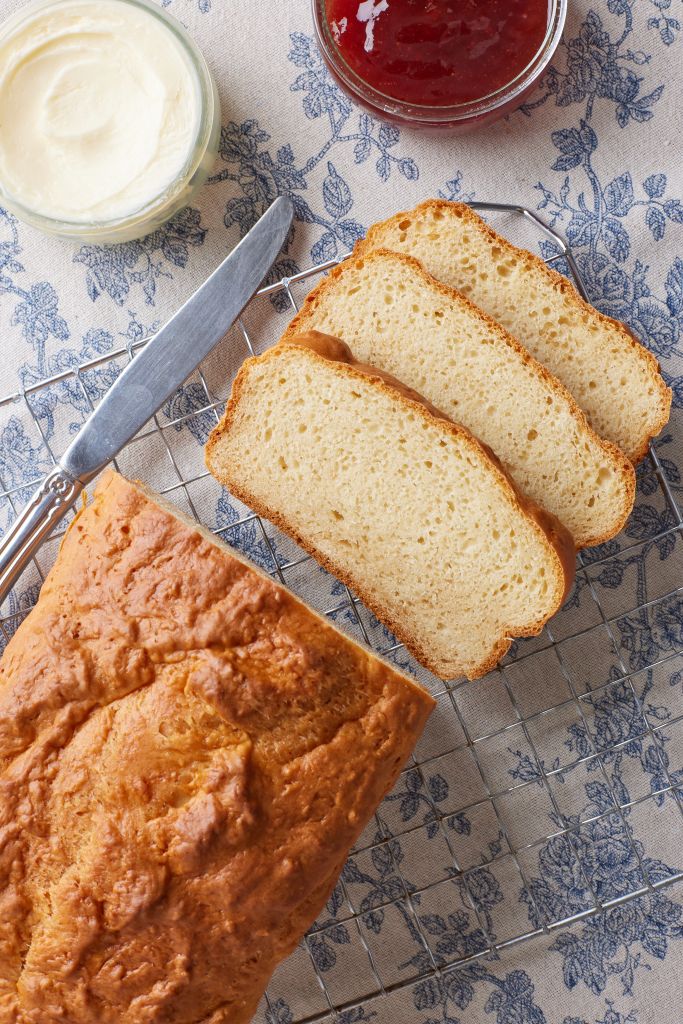 High Protein Bread is sliced and served with butter and jam