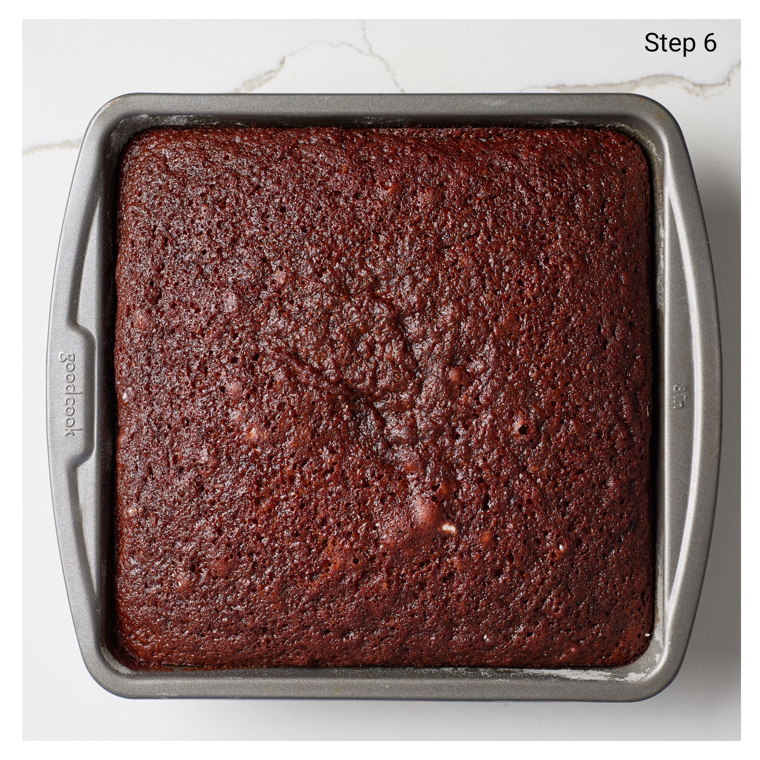 Baked Molasses Cake in a square metal tin. 