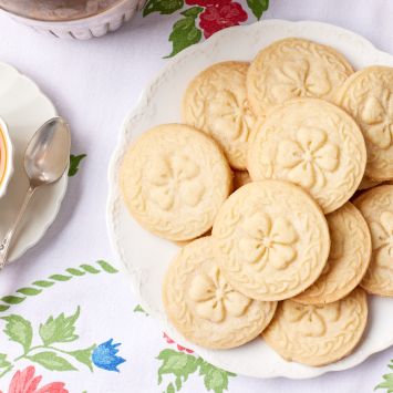 A plate of Irish Shortbread cookies with clover print.