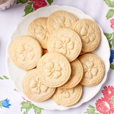 A plate of Irish Shortbread cookies with clover print.