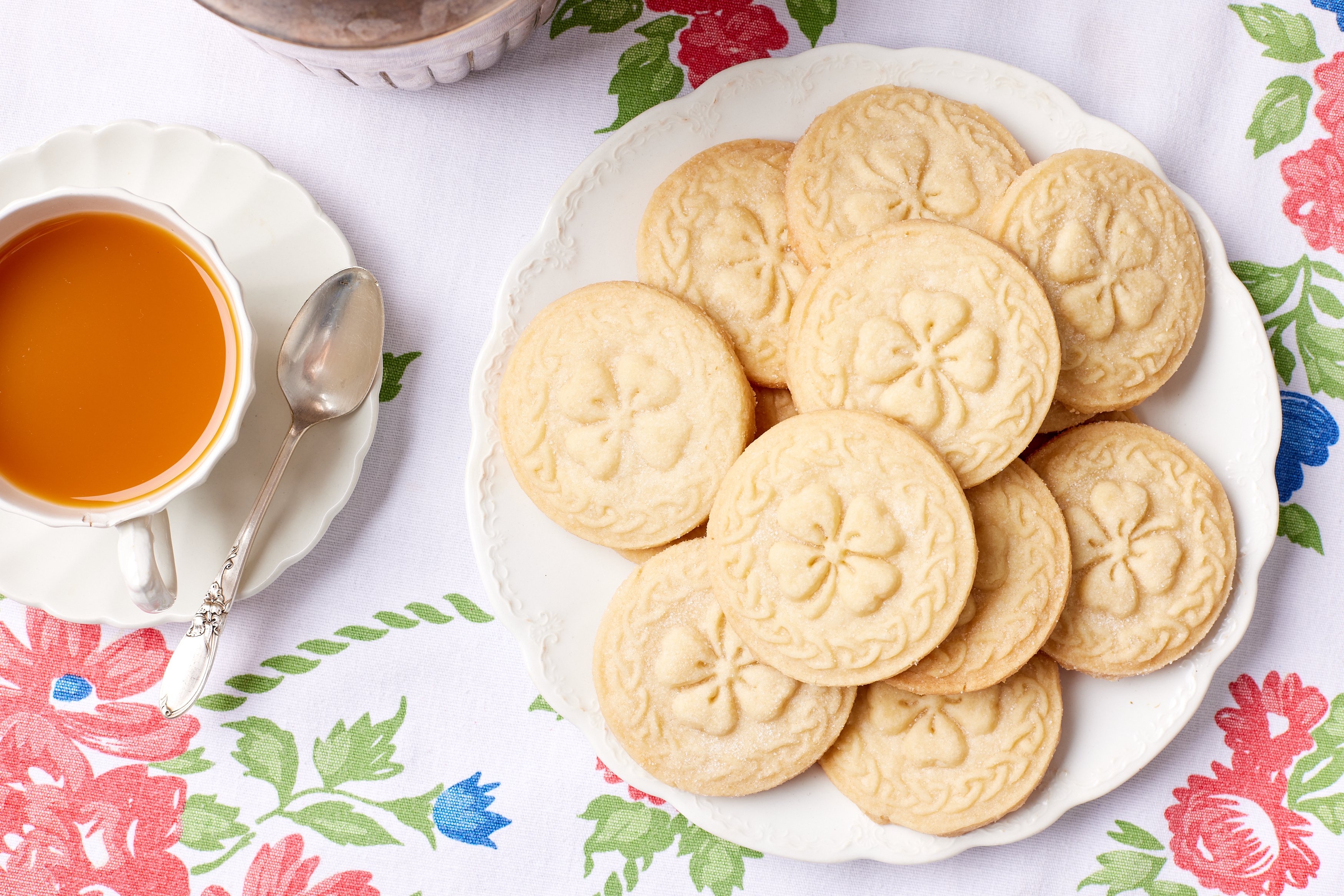 A plate of Irish Shortbread cookies with clover print.