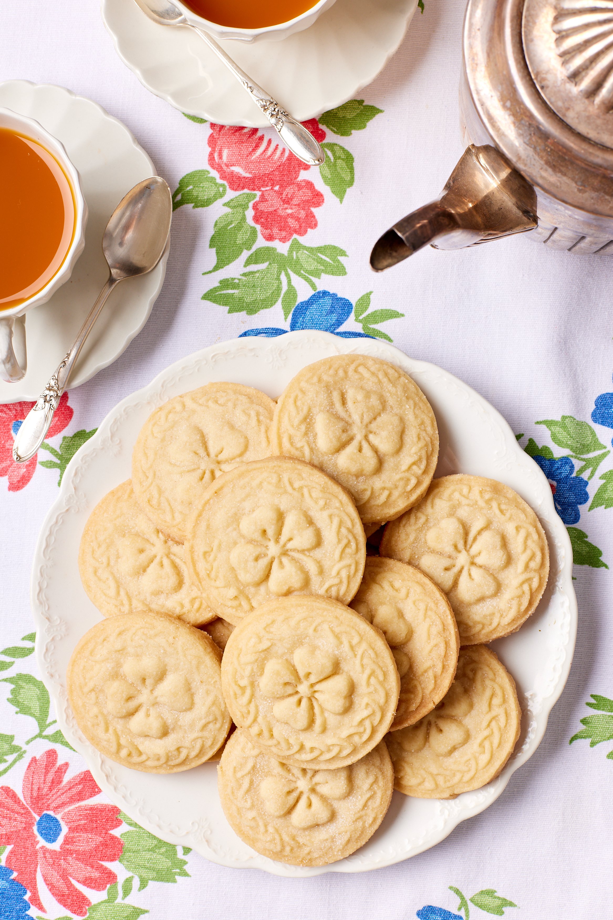 5 Ingredient Irish Shortbread12 A plate of lightly golden Irish Shortbread Cookies are served with tea.