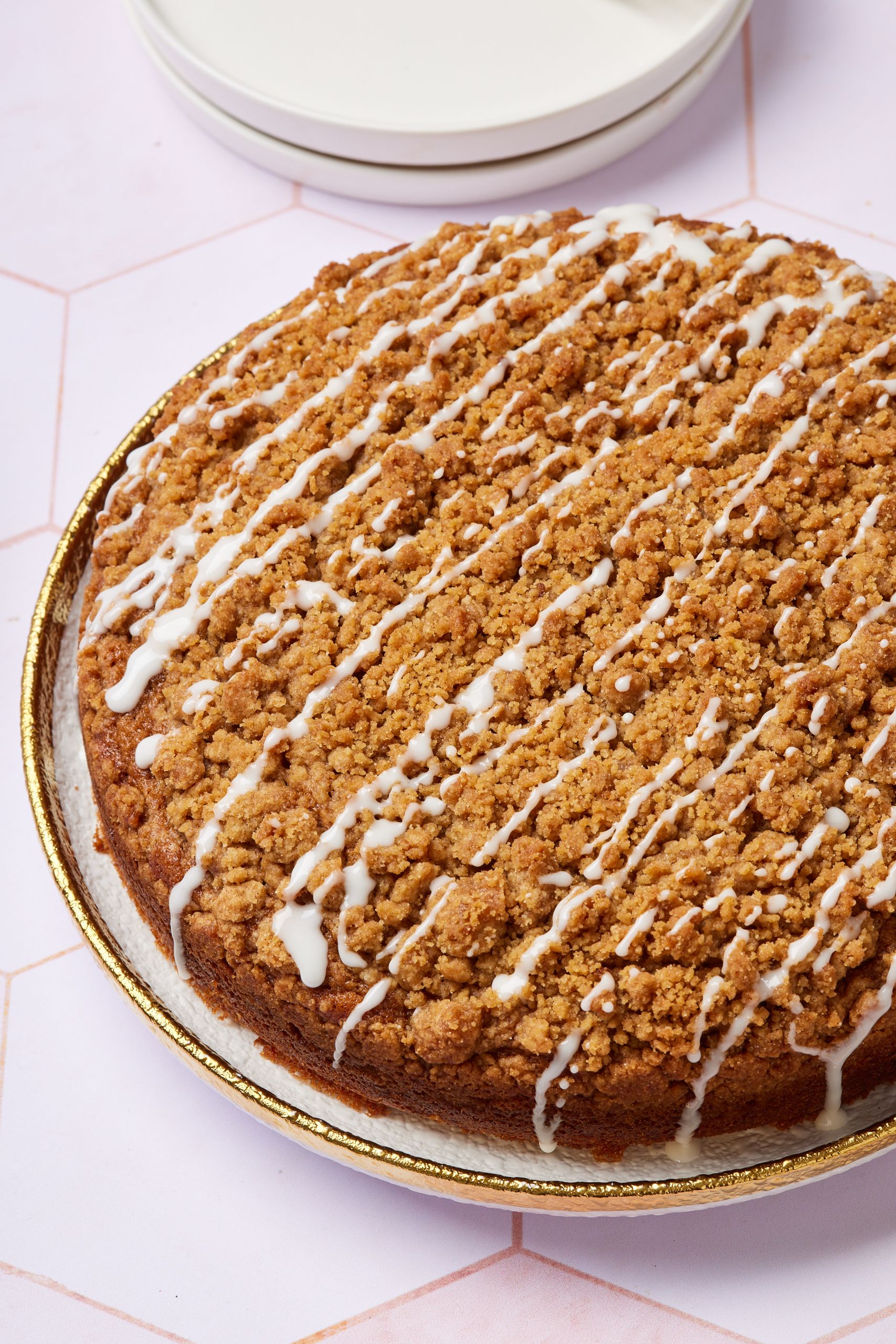 Irish Coffee Cake with golden brown Streusel topping and white vanilla glaze. 