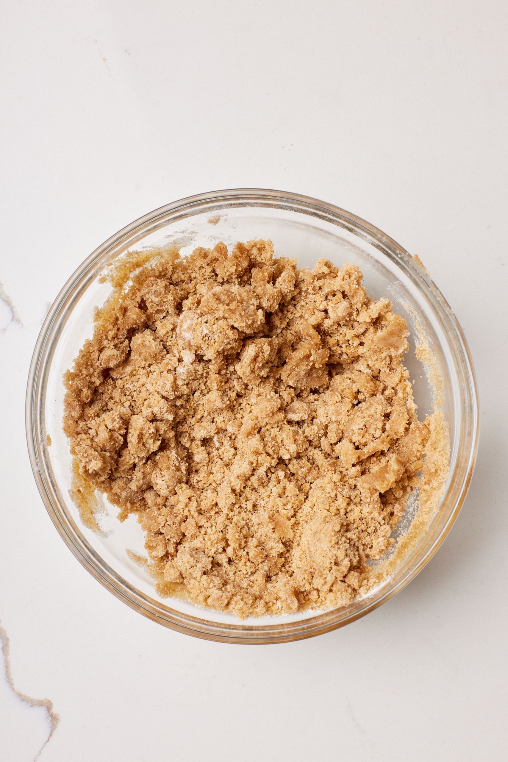 Step-by-step instructions on how to make Irish Coffee Cake: Make the streusel in a medium bowl: combine the flour, brown sugar, cinnamon and salt. Then stir in the melted butter until the mixture clumps together. 