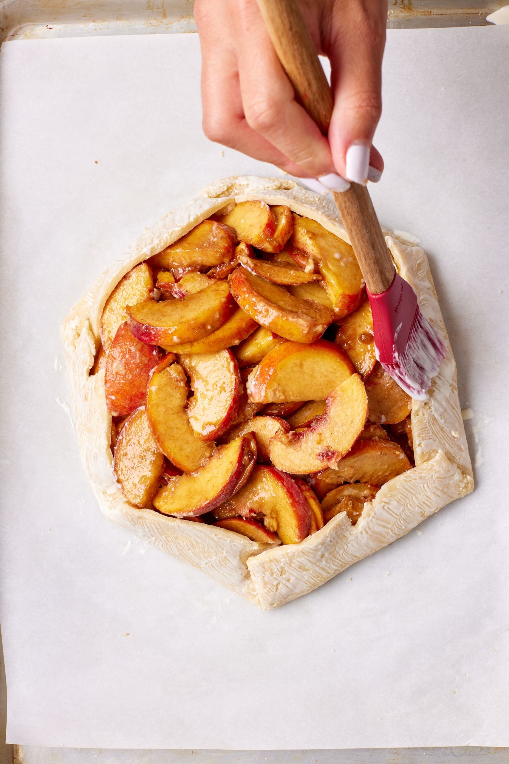 Finish tart: Brush the crust with cream, then sprinkle with the granulated sugar.