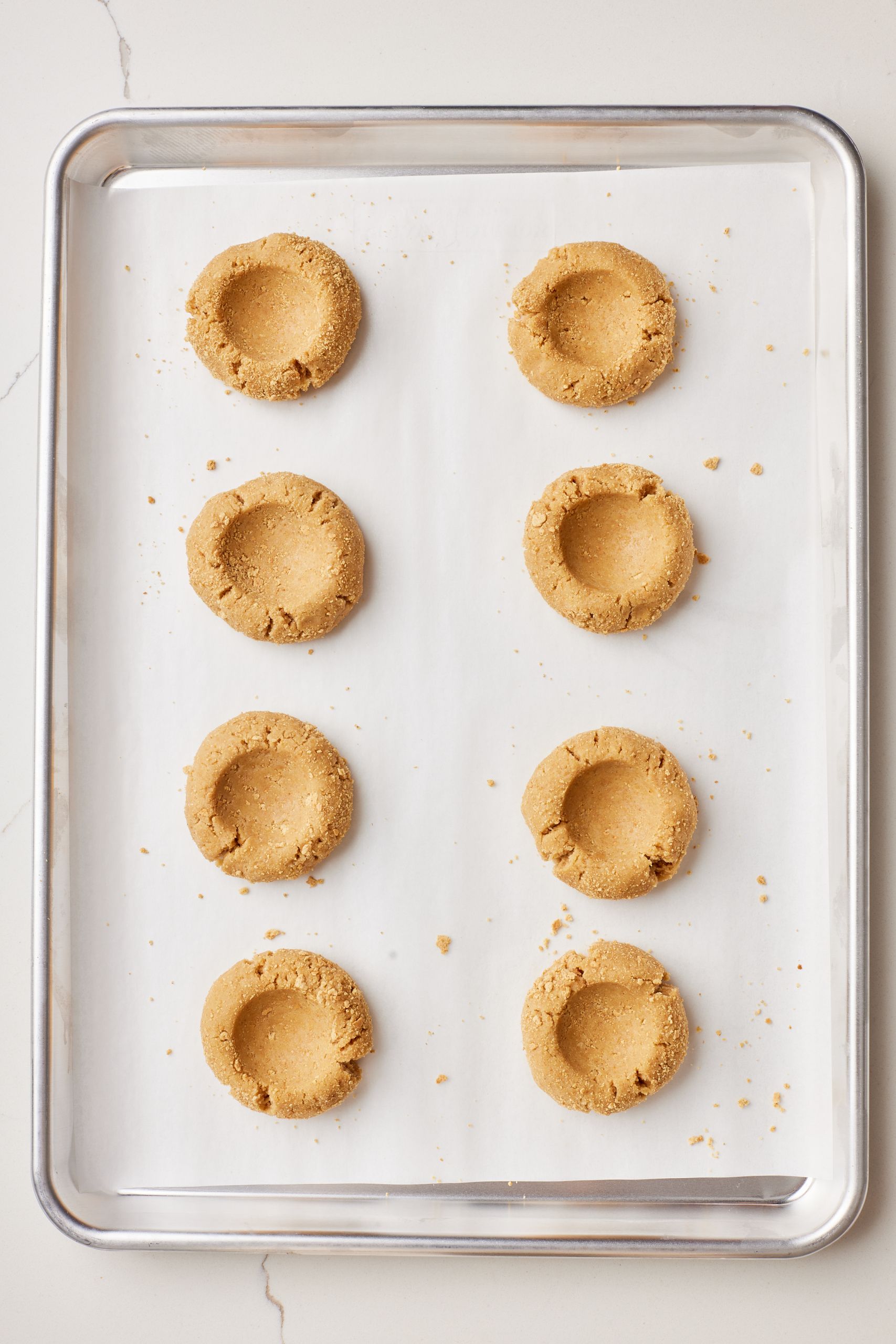 Make the indent deeper and bake again until lightly browned and just set.