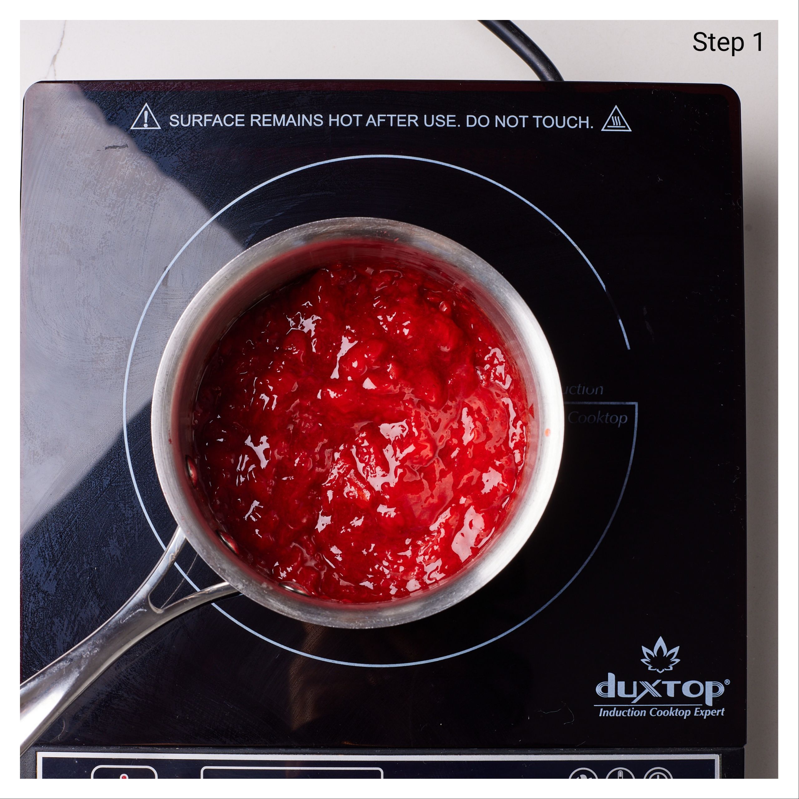 Step-by-step instructions for strawberry shortcake cupcakes: making strawberry compote filling: In a small pot, combine the strawberries, sugar, cornstarch, and lemon juice and cook over medium-low heat until the mixture begins to simmer and the strawberries soften and release their juice.
