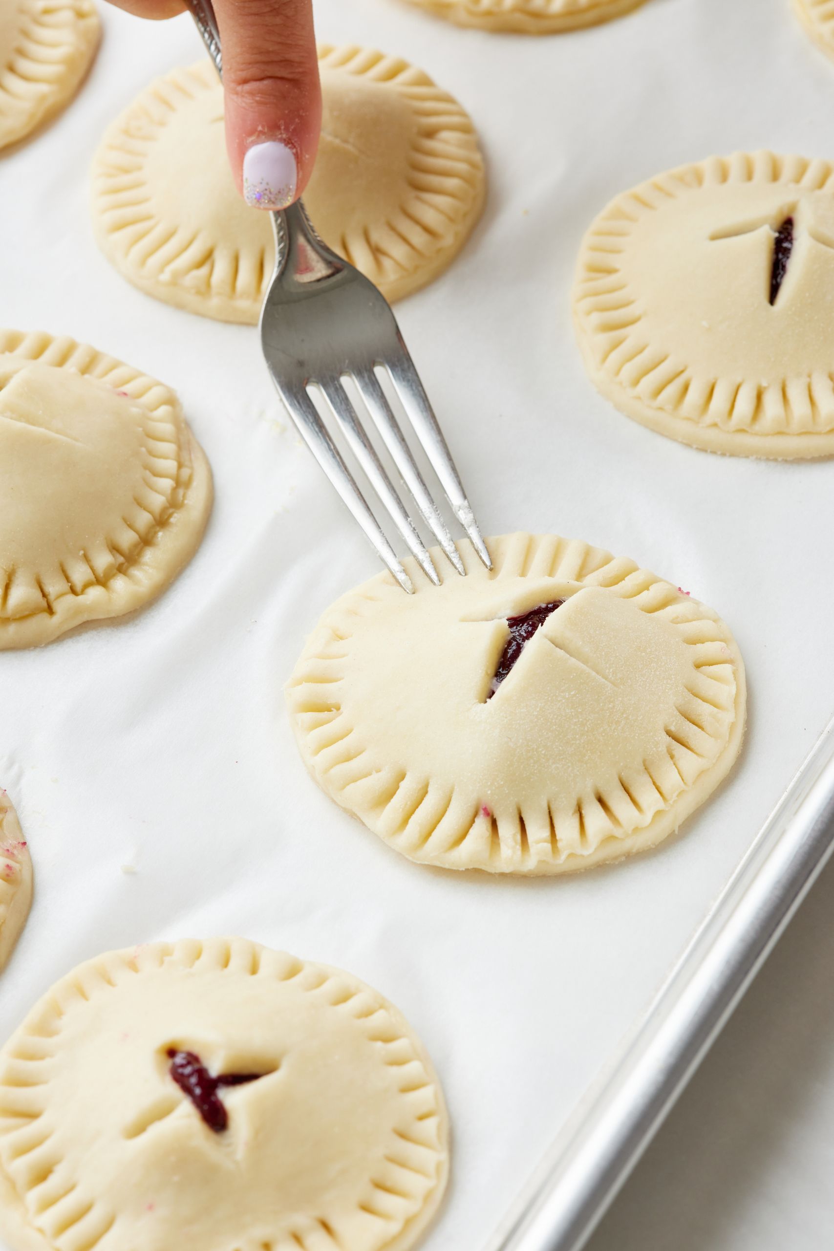 Use a fork to crimp the crusts together. 