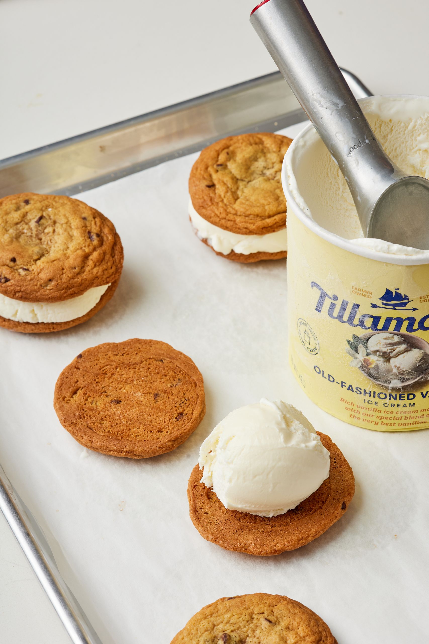 Scoop ice cream onto the bottom cookie