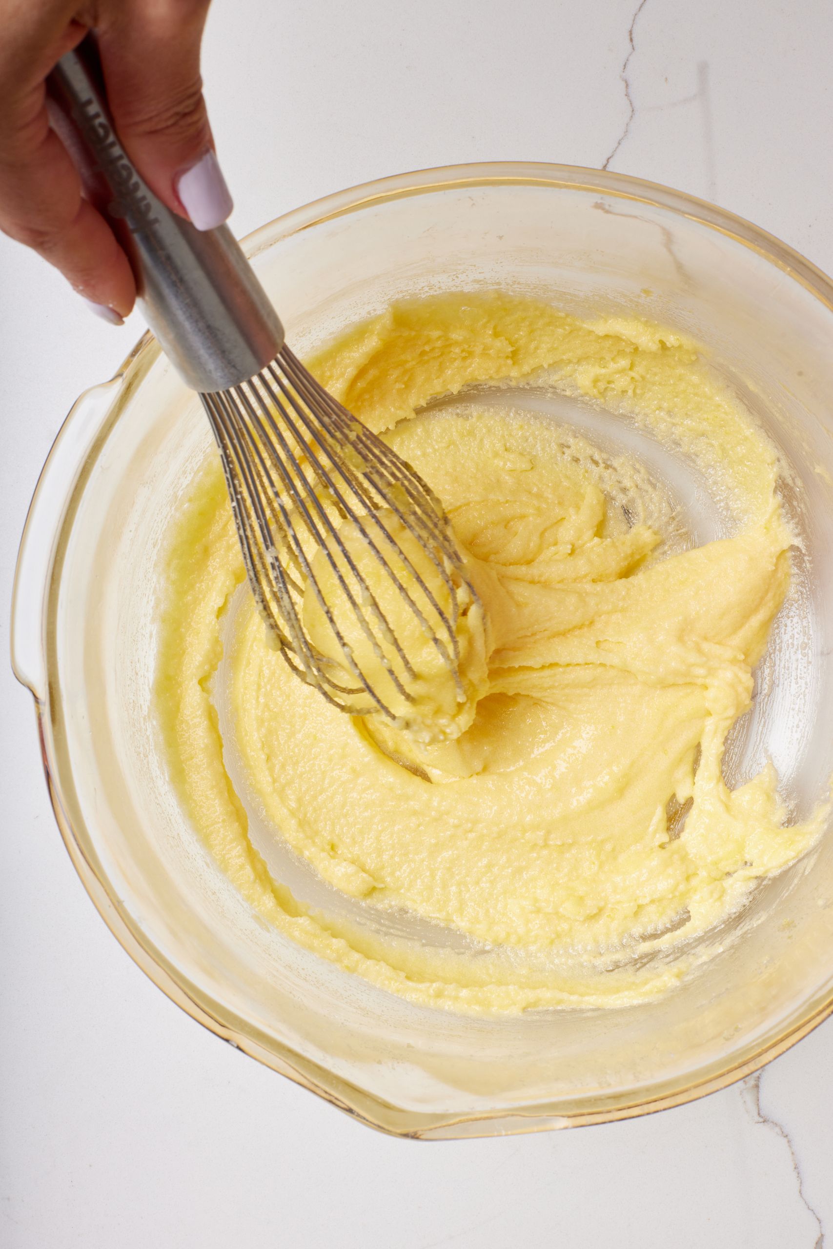 In a heatproof bowl, whisk egg yolks, sugar and salt.
