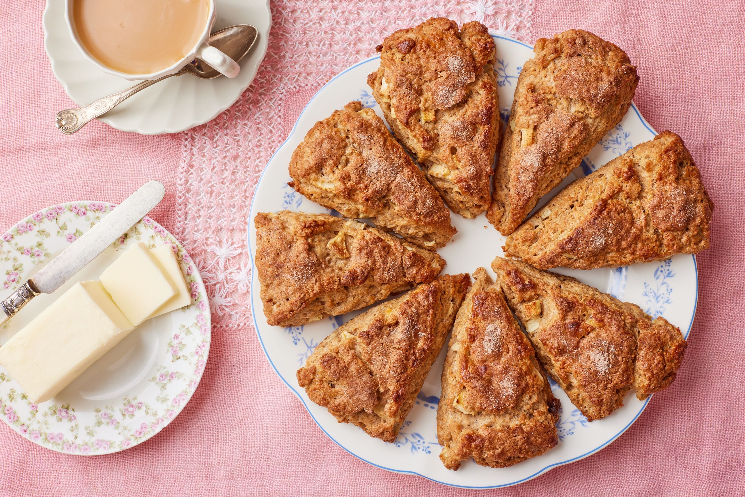 Apple Cinnamon Scones served with butter and tea.