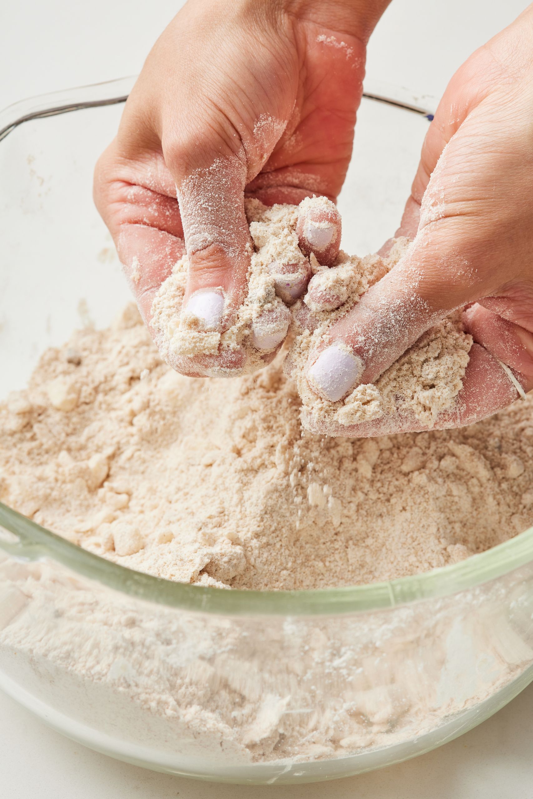 Step-by-step instructions on how to make apple cinnamon scones: rub butter in the dry ingredients mixture until it resembles breadcrumbs. 