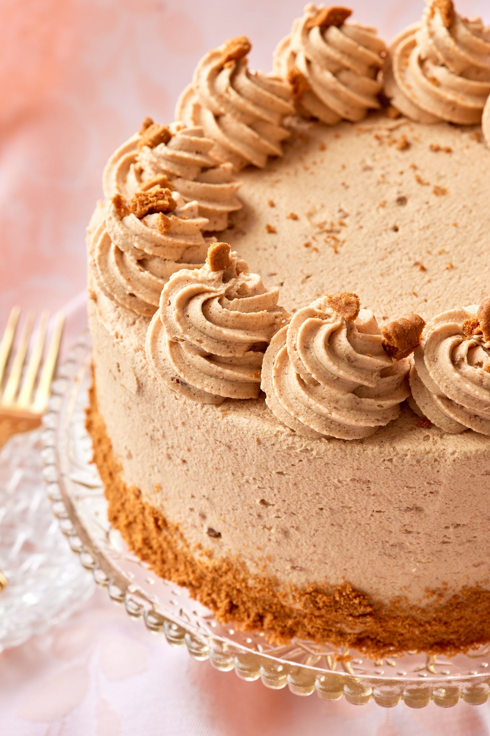 Biscoff Cake decorated with rosettes of cookie butter