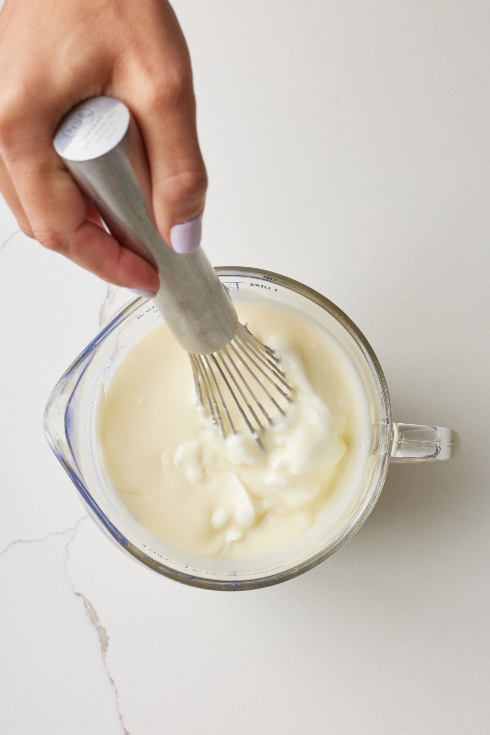 Pour into a heat-proof jug and cool 