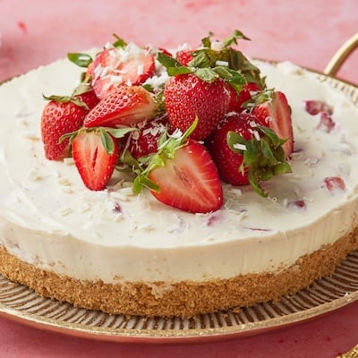 Strawberry white chocolate cheesecake with fresh strawberries