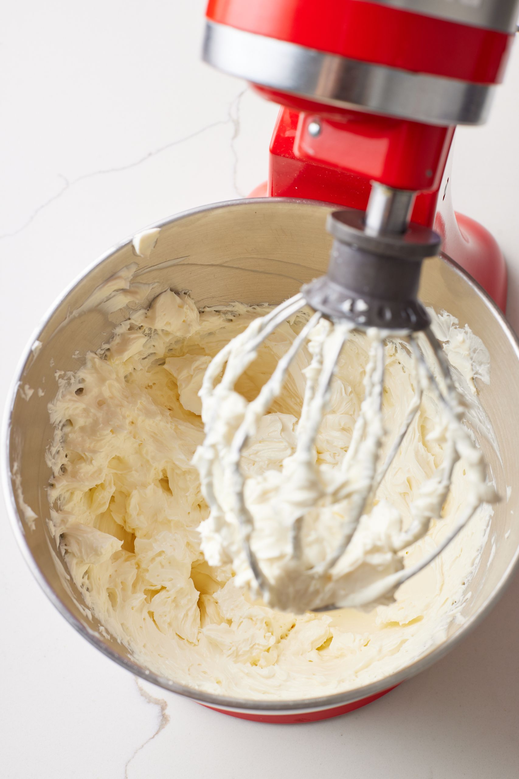 Whip up cream cheese and sugar until light and fluffy