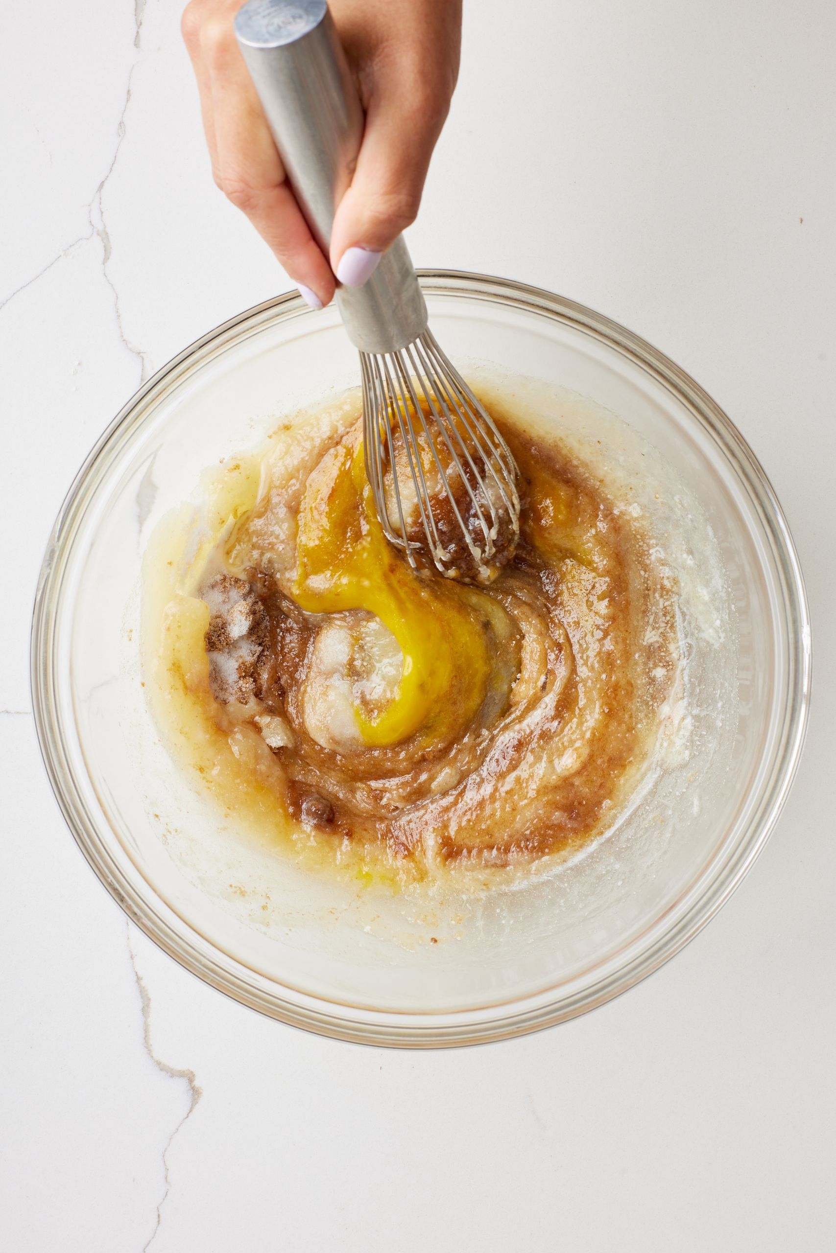 Mix wet ingredients into dry ingredients. 