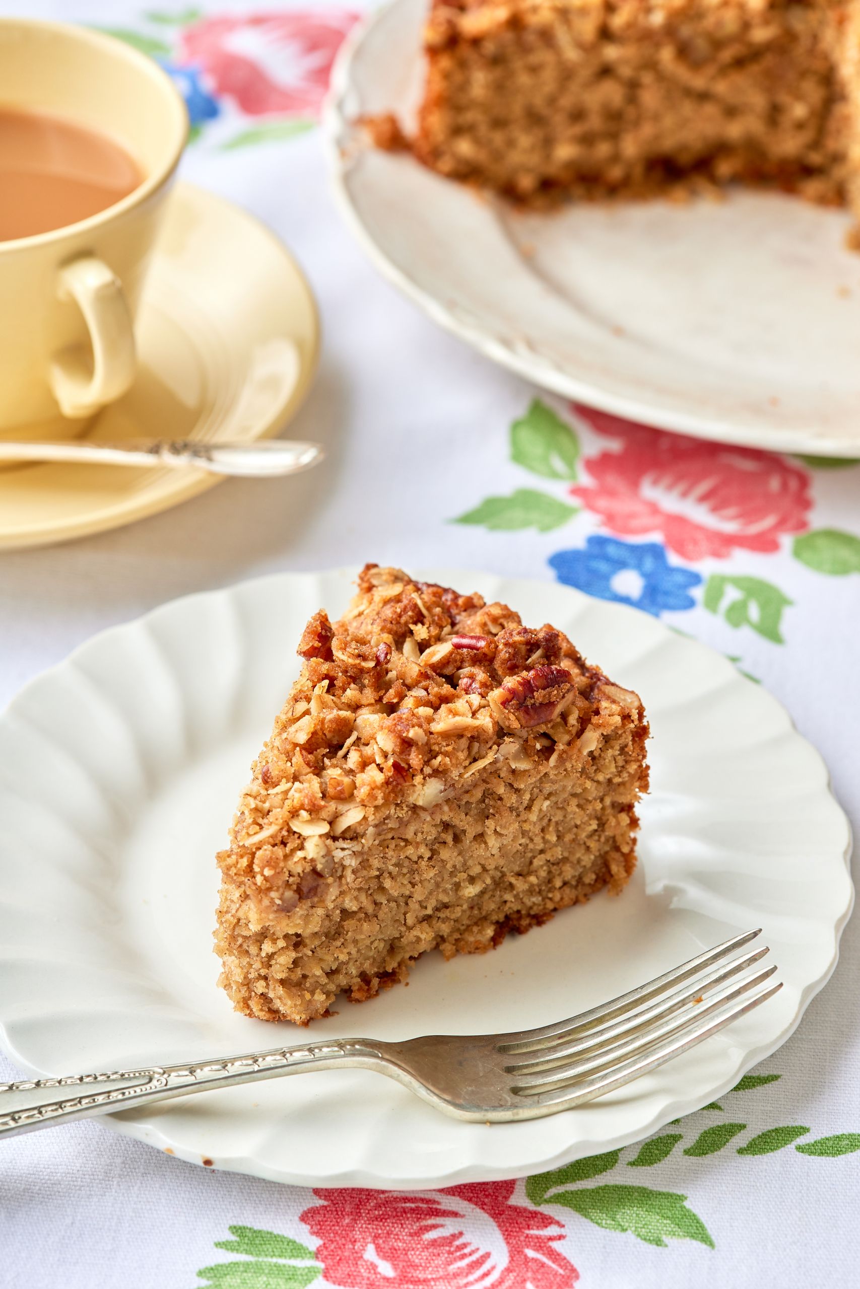 A close-up shot at a slice of Appel oatmeal cake. 
