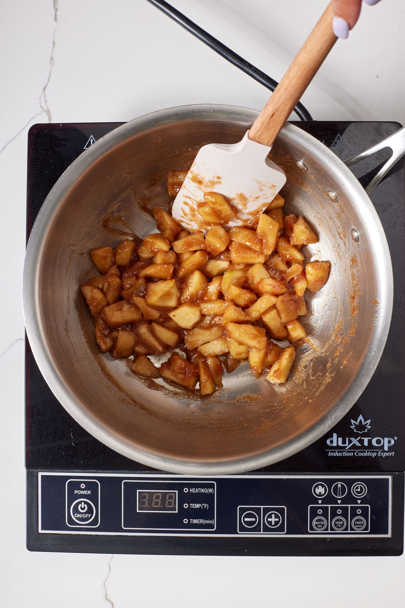 Step-by-step instructions on how to make apple turnovers: combine the apples, brown sugar, lemon juice, butter, cornstarch, and cinnamon and bring to a simmer, cook until tender.