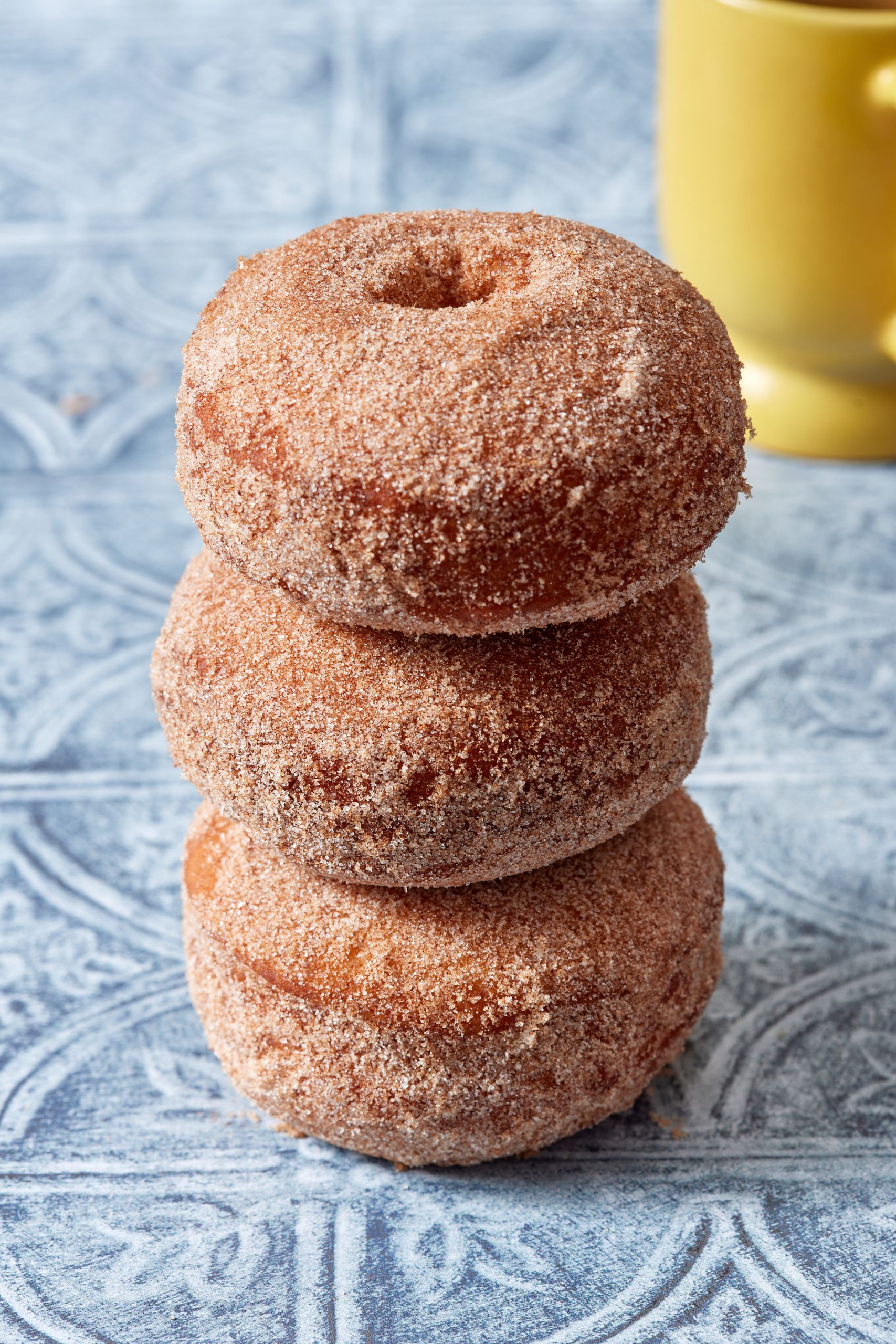 A stack of 3 potato donuts