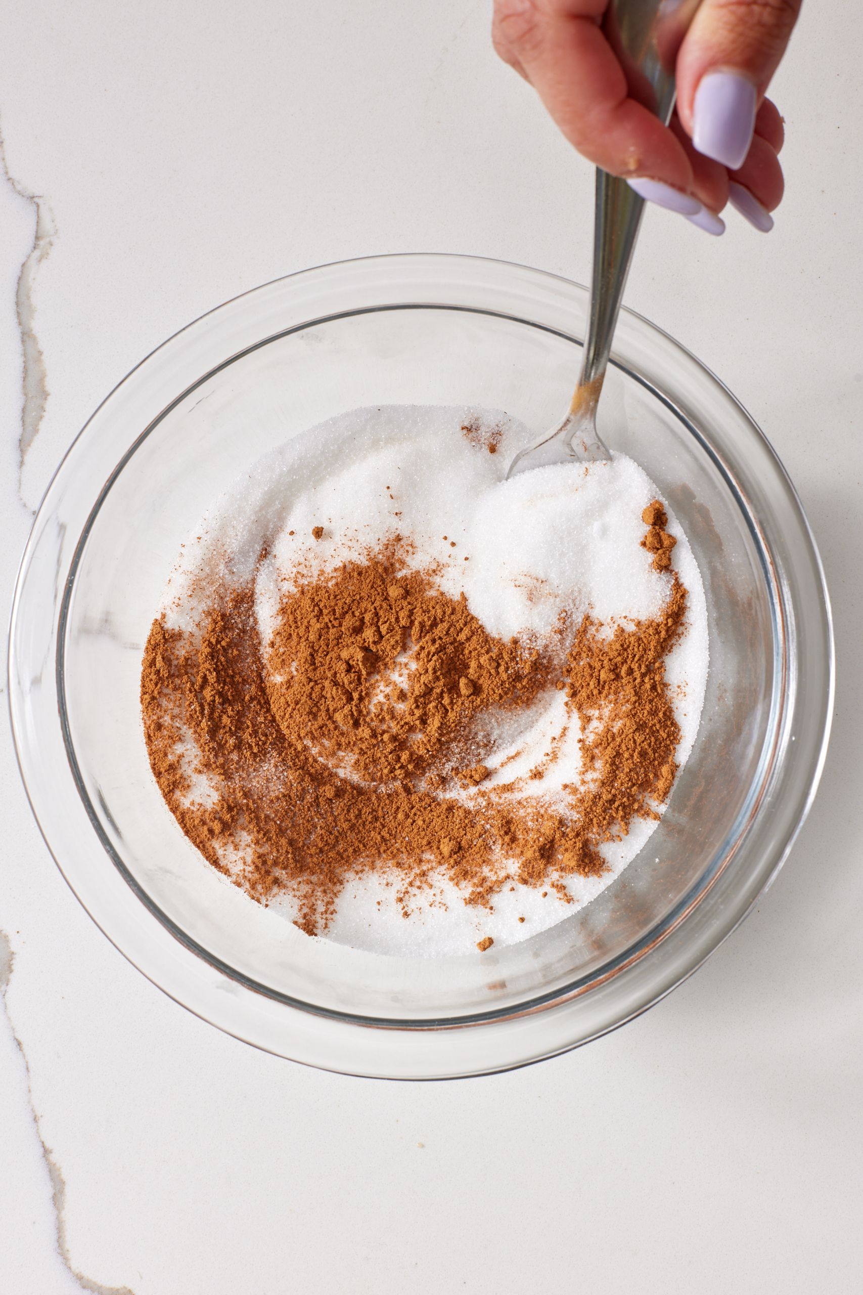 In a shallow separate bowl, mix together the sugar, cinnamon, and salt until combined. Set aside.