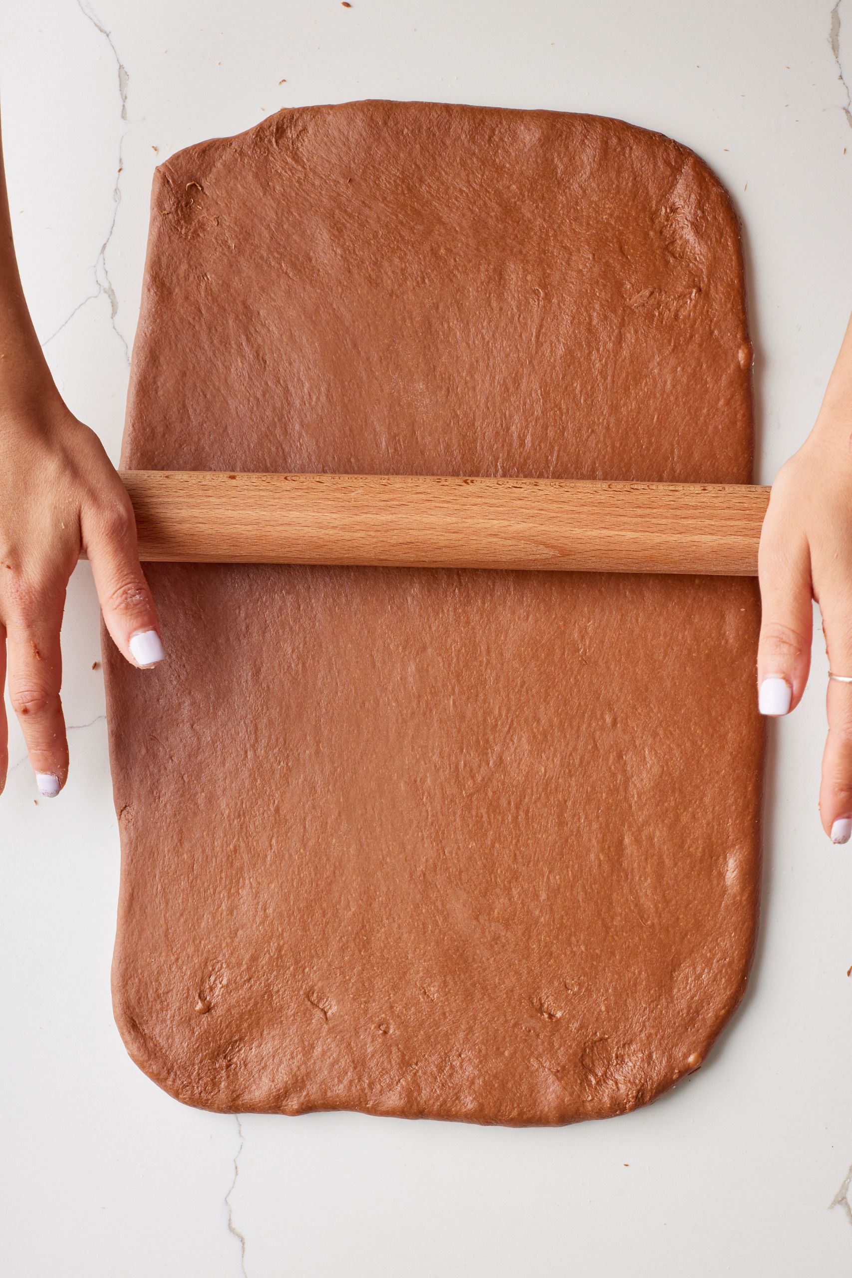 roll the dough into a 10x15 inch (25 ½ cm x 38 cm) rectangle.