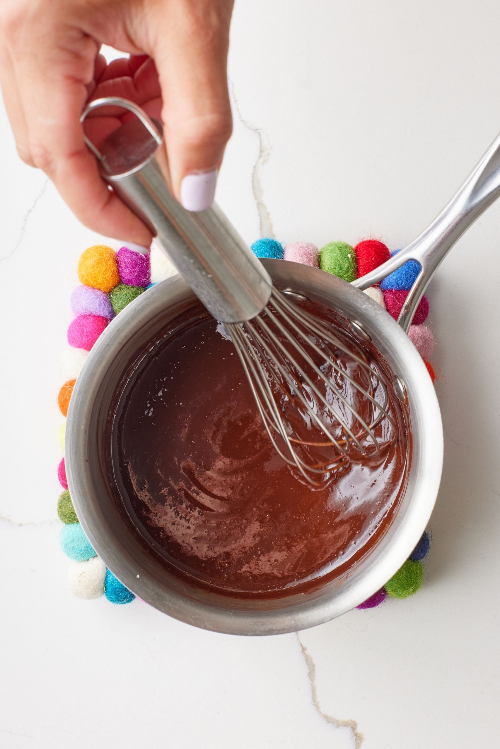 Melt butter and chocolate in a bowl.