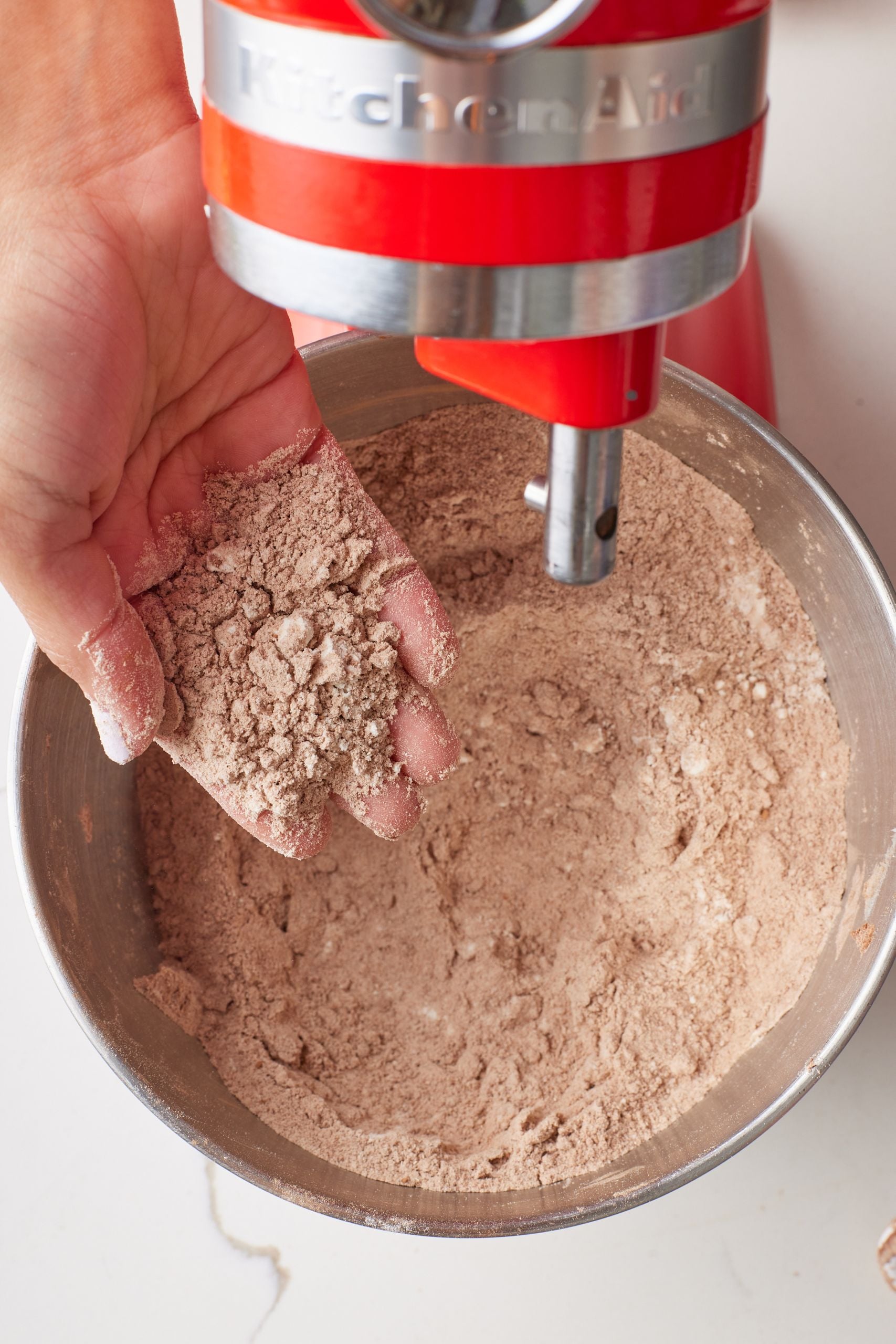 Step-by-step instructions on how to make Chocolate Cinnamon Rolls: mix dry ingredients . 