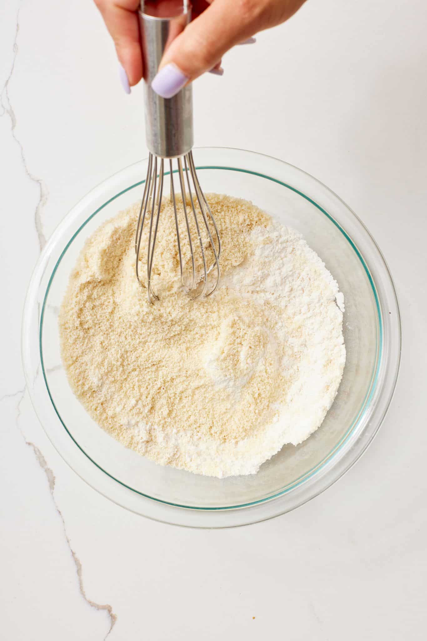 Step-by-step instructions on how to make Cranberry Bras: mix dry ingredients together. 