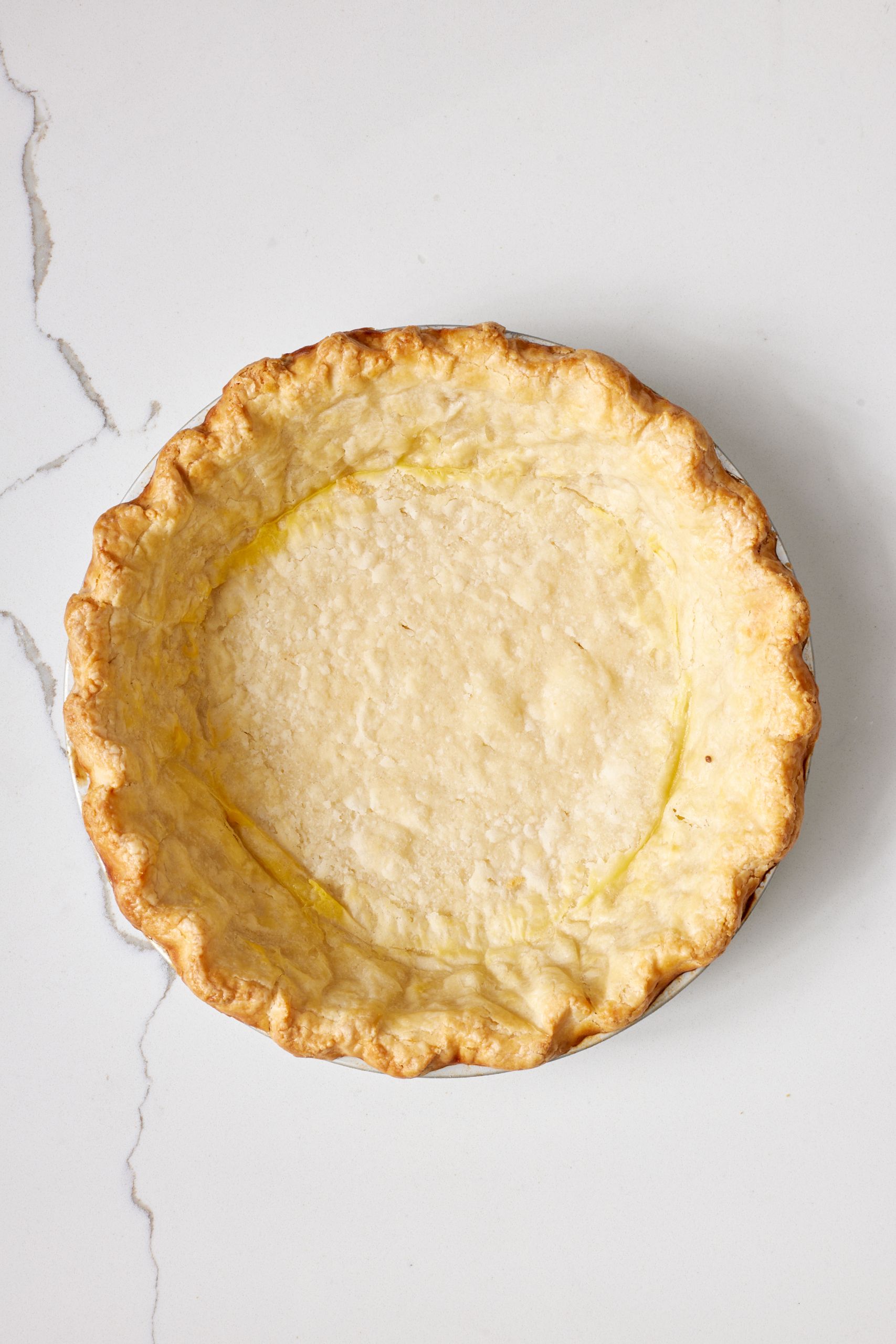 Sugar Cream Pie2 Step-by-step instructions on how to make Sugar Cream Pie: Blind bake the crust until the crust looks golden and dry.