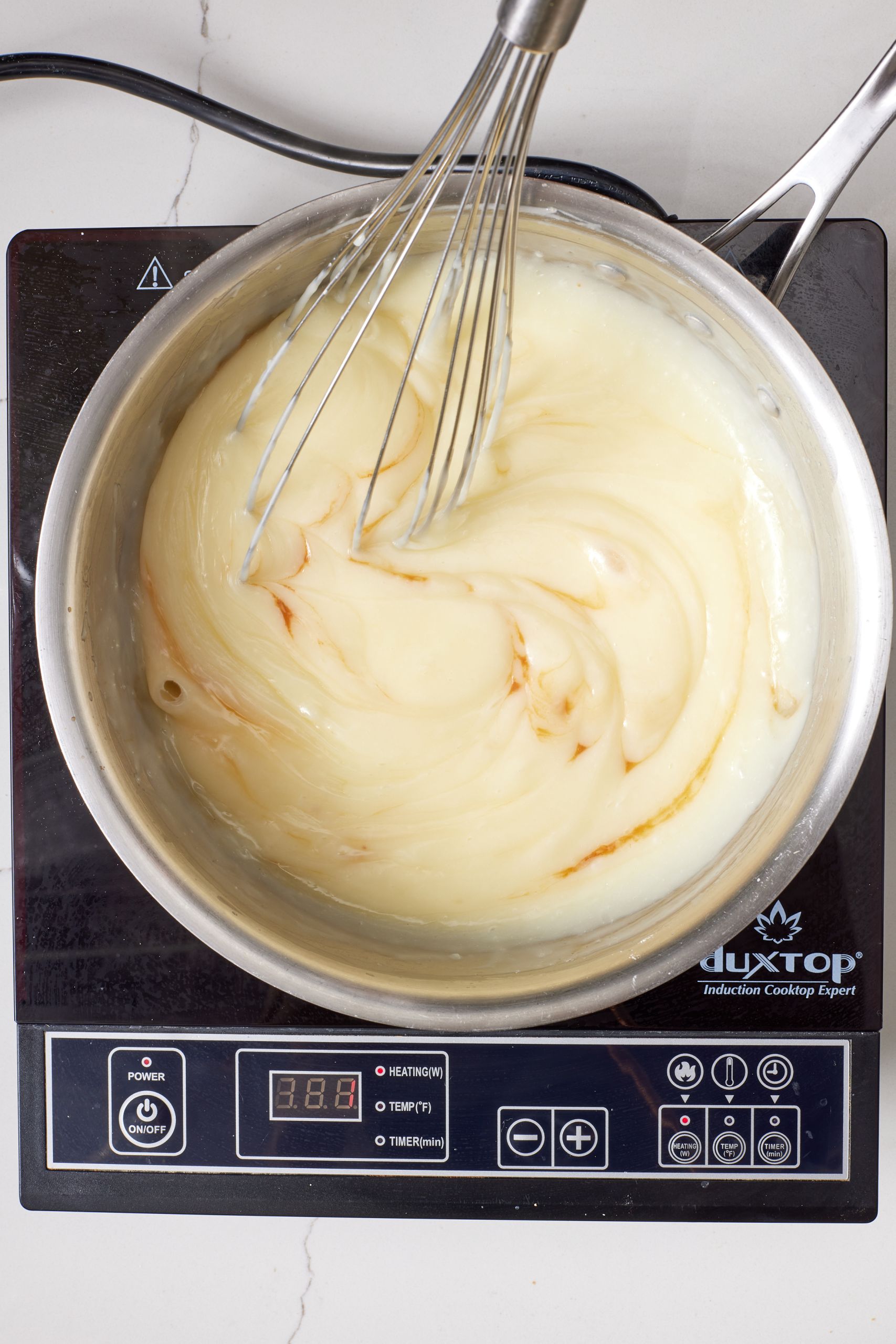 Sugar Cream Pie5 Stir in the vanilla extract .