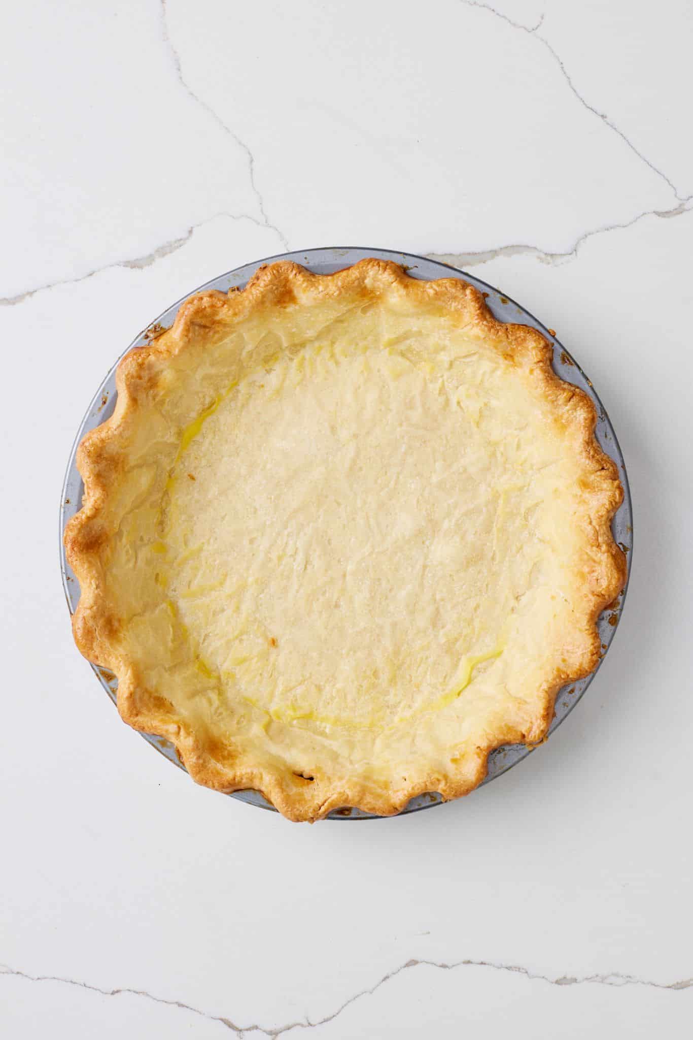 A baked gold pie crust for French Silk Pie. 