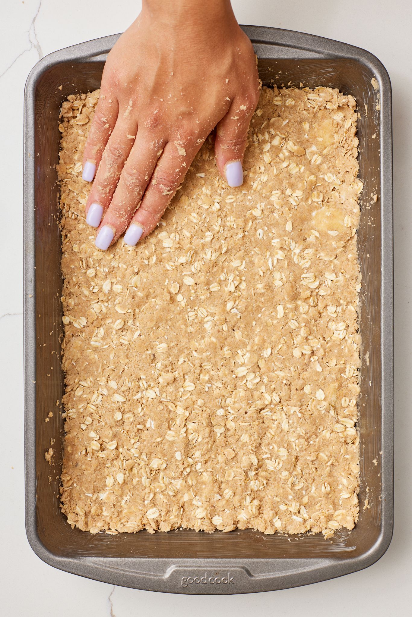 Make the base layer with rolled oats. 