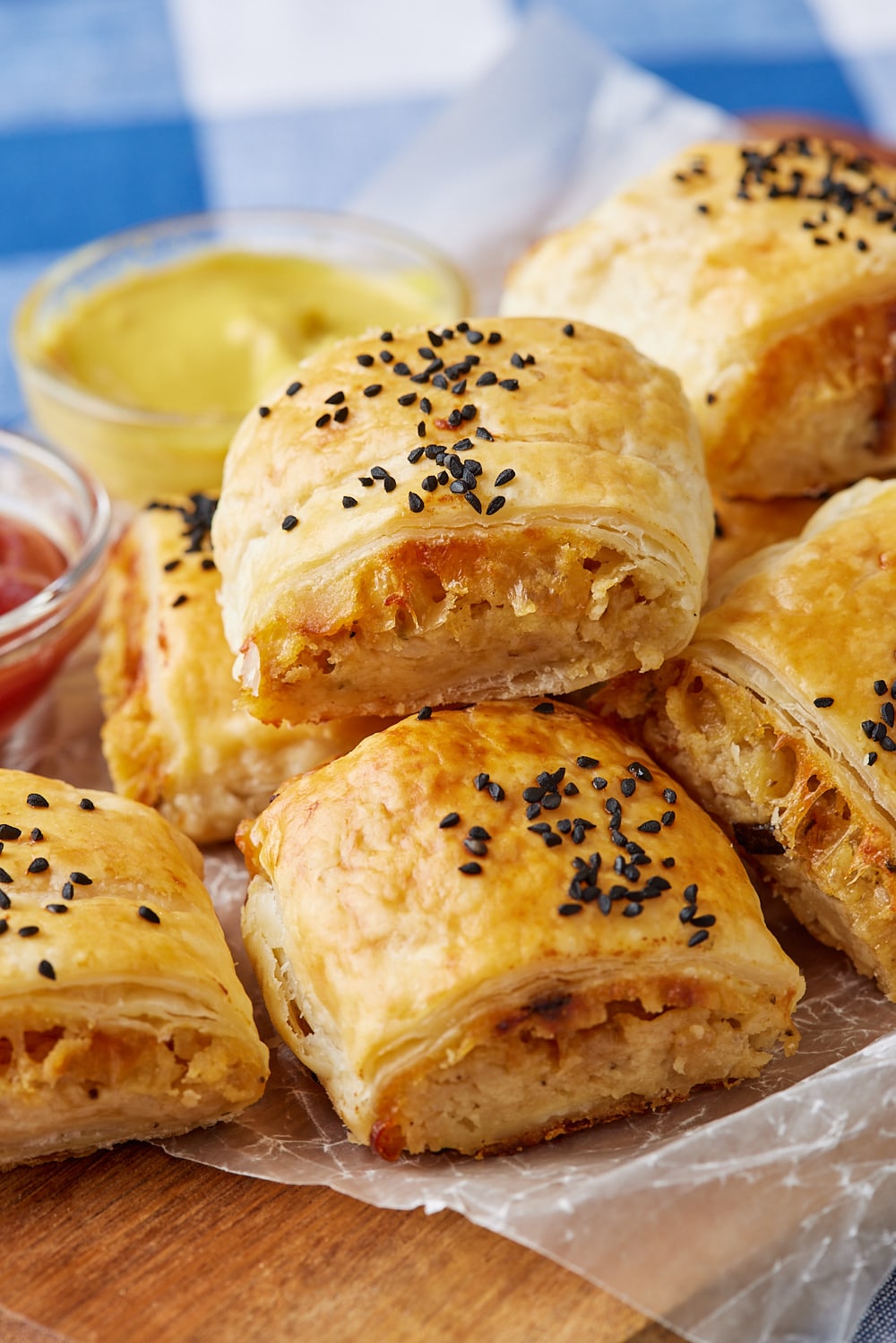 Cheese and Onion Rolls16 Close-up shot at a plate of golden brown cheese and onion rolls.