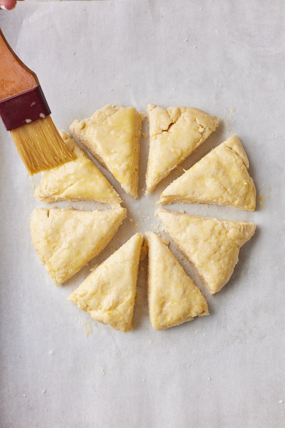 Irish Soda Bread Scones5 Cut the Soda Bread Scone disc into 8 wedges and brush the top with egg wash.