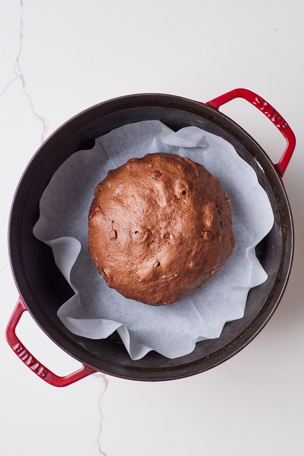 Chocolate Sourdough Bread9 A chocolate sourdough bread dough put in a dutch oven.