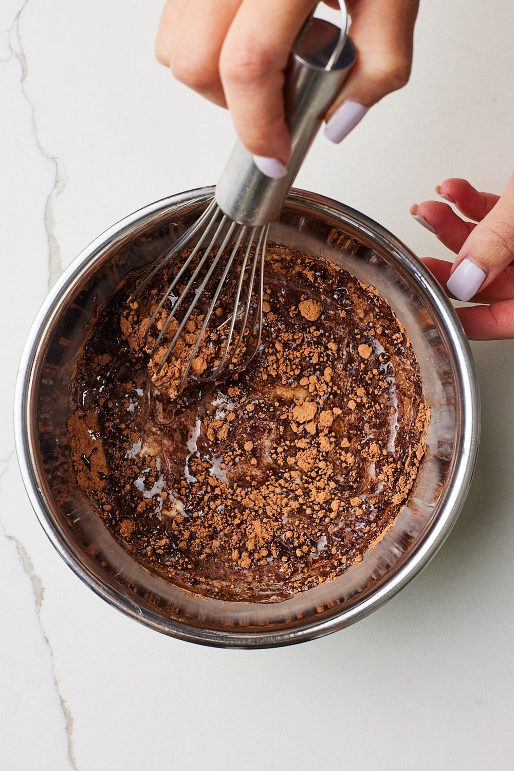Whisk frosting ingredients in w bowl. 