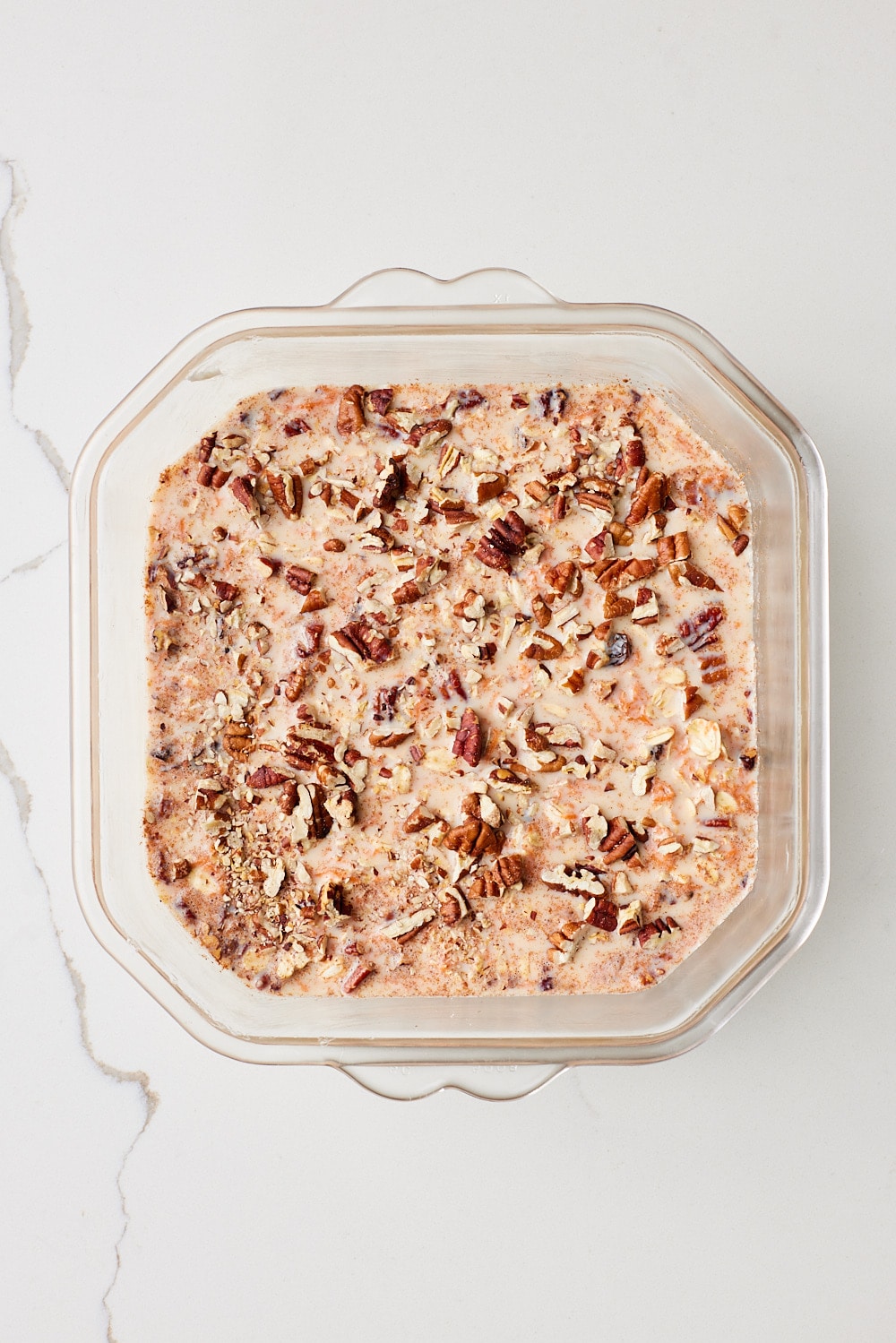 Carrot Cake Baked Oats4 Carrot Cake Baked Oatmeal batter in a baking dish.