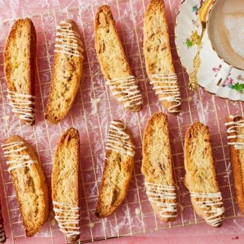 Top-down view of Lemon Biscotti on the cooling rack, served with tea.